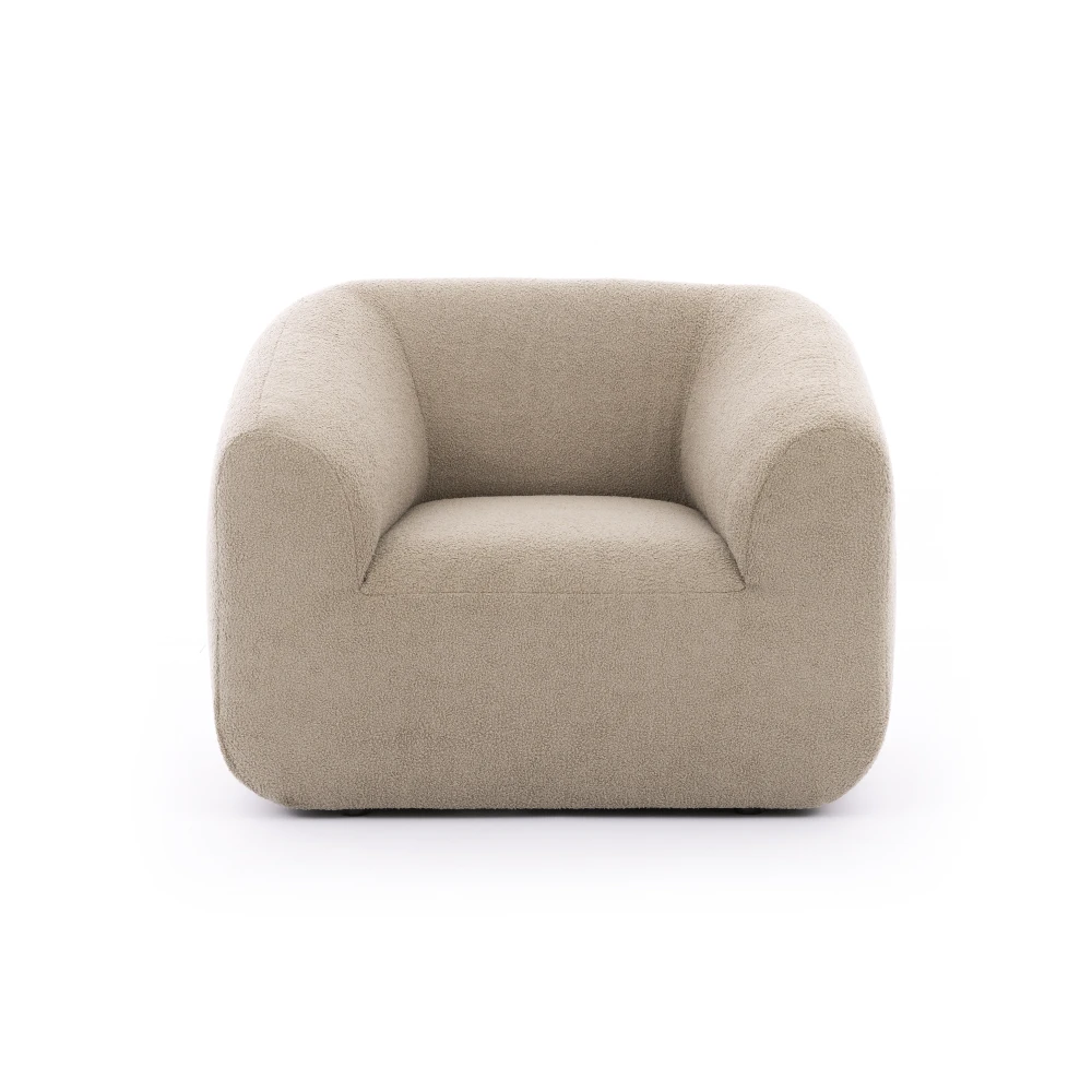 Fotel Varesso Wygodny Mebel zachwyca miękką, zaokrągloną formą i nowoczesnym designem. Komfortowe siedzisko oraz minimalistyczna bryła idealnie dopełnią eleganckie wnętrza.